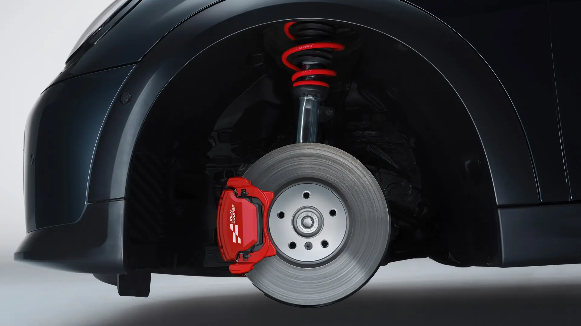 MINI John Cooper Works ‑urheilujousitus John Cooper Works Chili Red ‑jousilla.